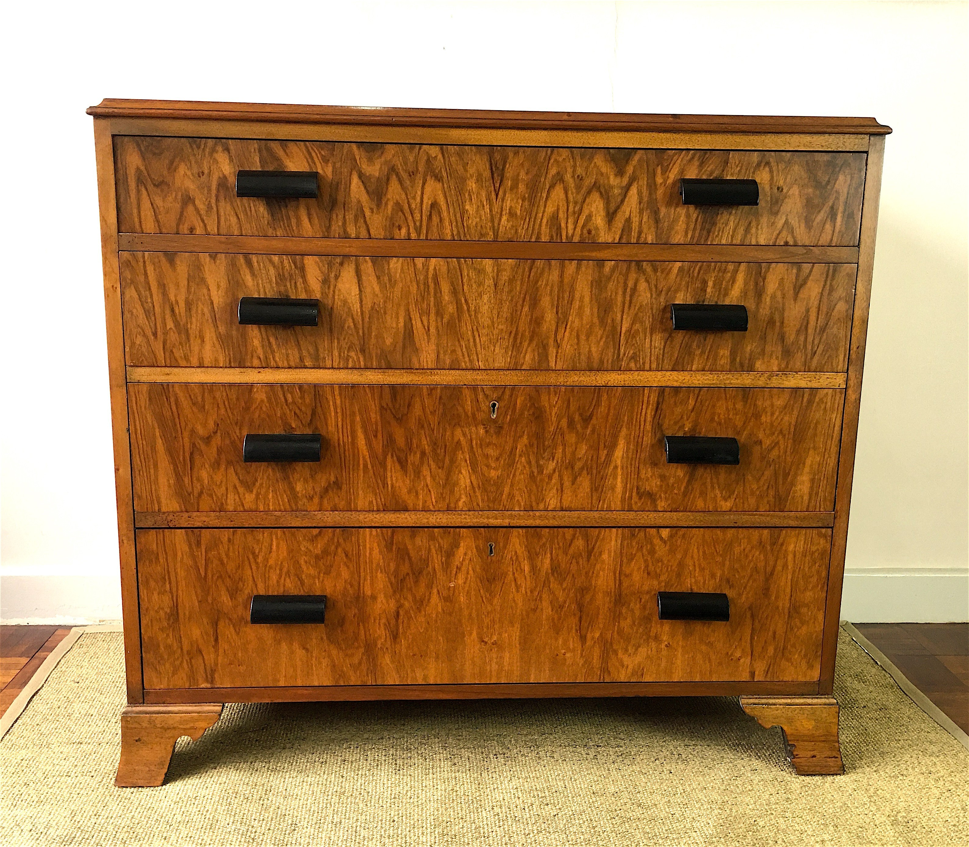 An Art Deco style figured walnut chest of four drawers, width 92cm, depth 50cm, height 83cm